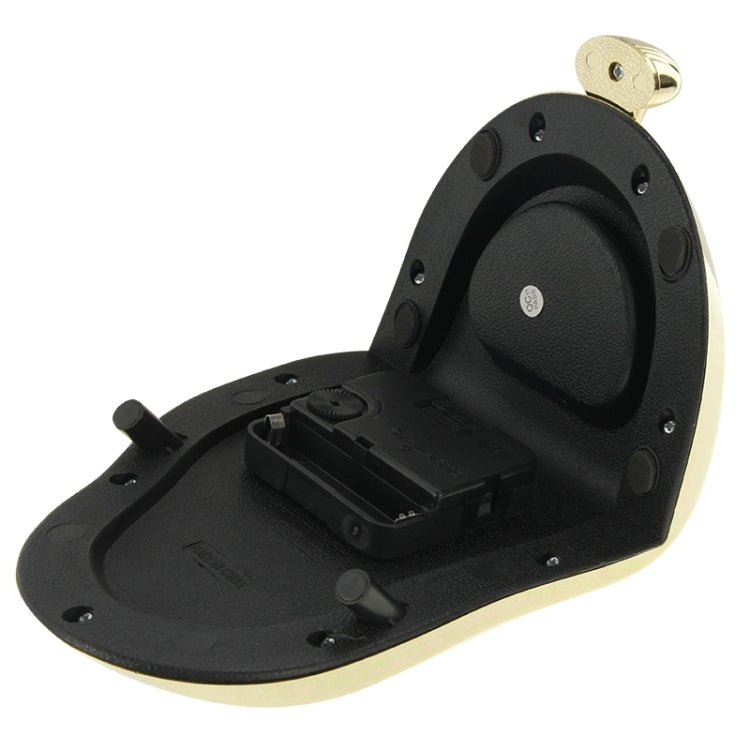 Open back novelty clock mechanism on black base with gold hanging loop