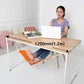 Orange foot hammock under desk with adjustable ropes supporting a seated user’s feet