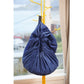 Hanging navy-blue kids toy storage bag with gathered drawstring closure