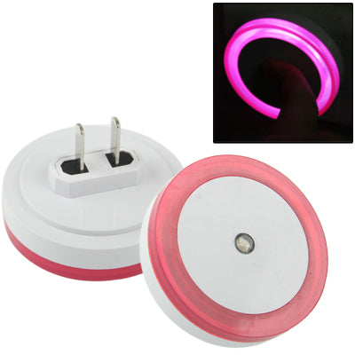 Pink LED night light with socket, glowing circular ring