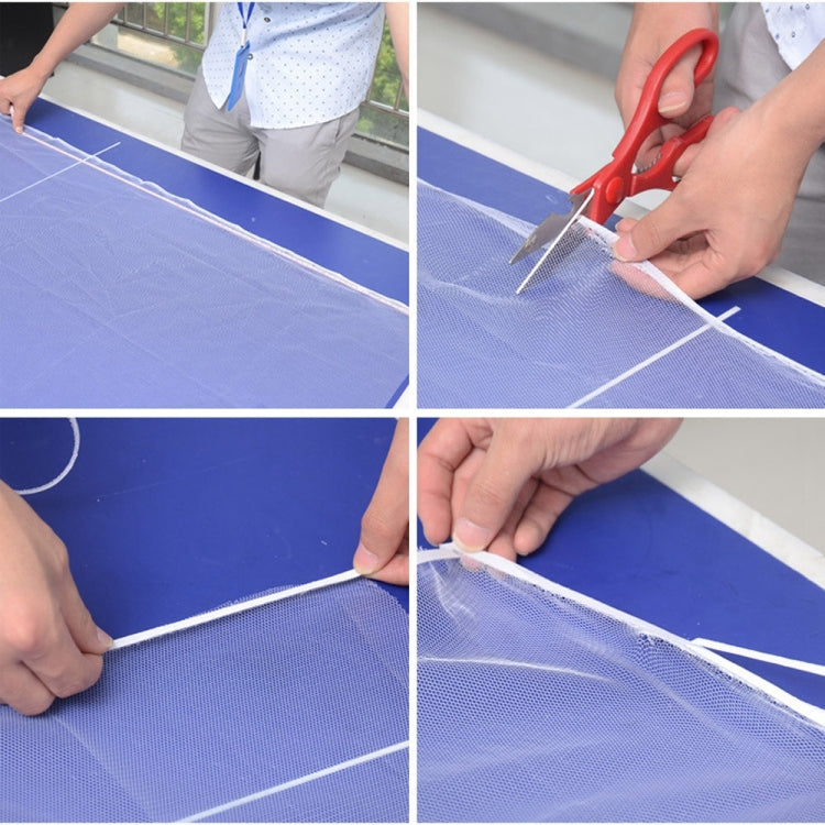 Hands trim blue fly screen mesh with scissors along the white edging