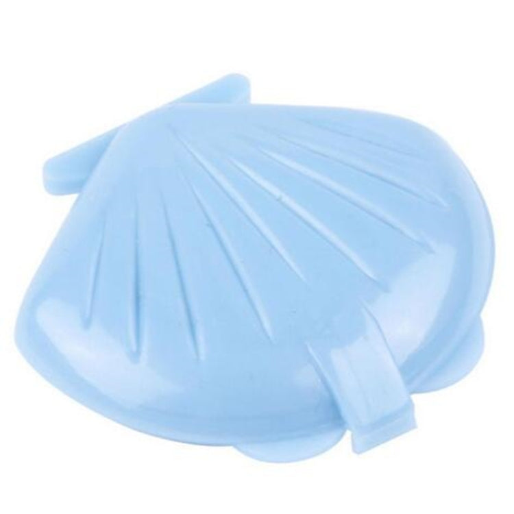 Light blue anti-snore nose clip closed, hinged shell with side tab