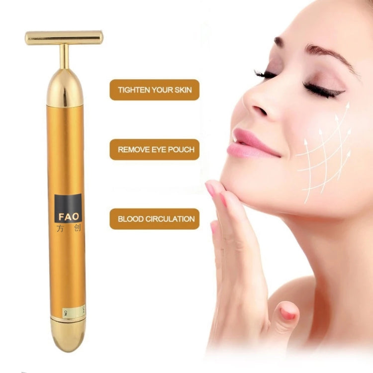 Gold electric face massage stick with T-bar head beside facial diagram.
