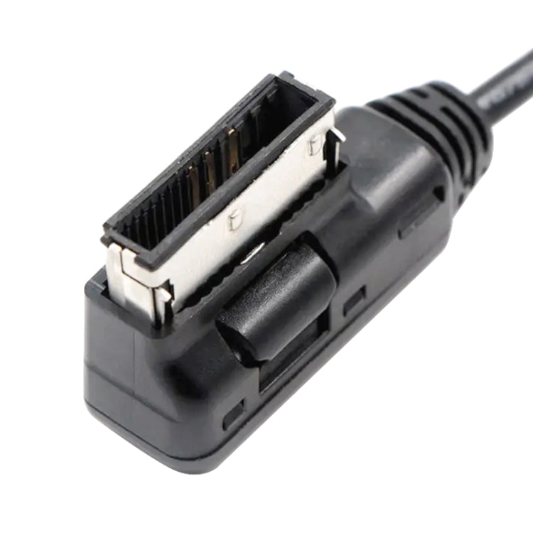 Black AMI connector end with exposed contacts, adapter cable plug housing