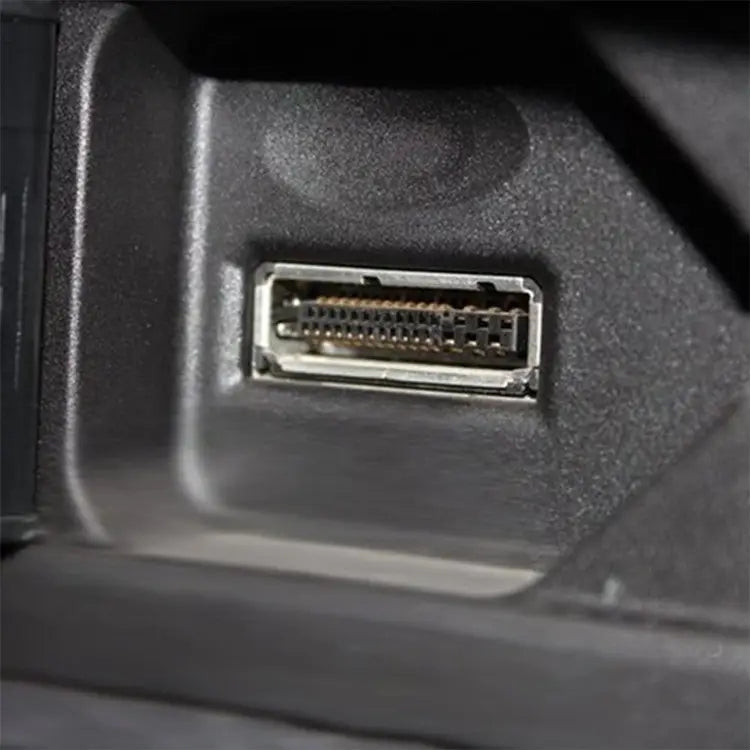 AMI port socket with exposed pins on black housing, close-up