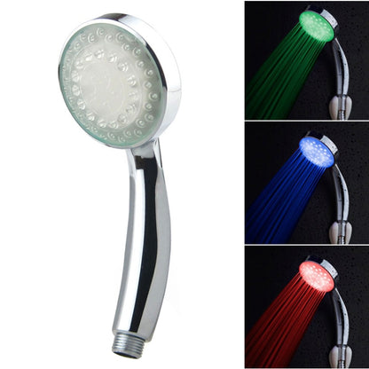 Chrome LED shower head with round face and clear diffuser