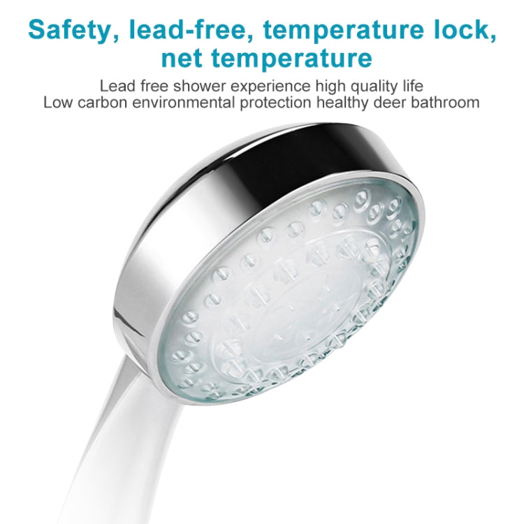Chrome LED shower head with translucent spray plate, close-up