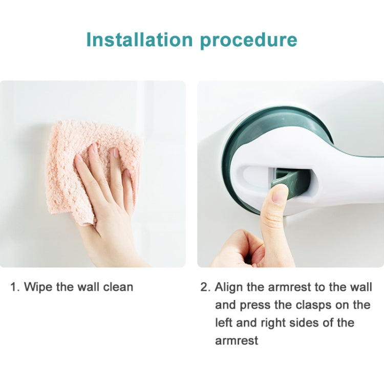 Suction safety handle in white with dark green pads, shown during wall mounting