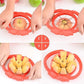 Red apple separator device in use, hands arranging sliced apples on the blades