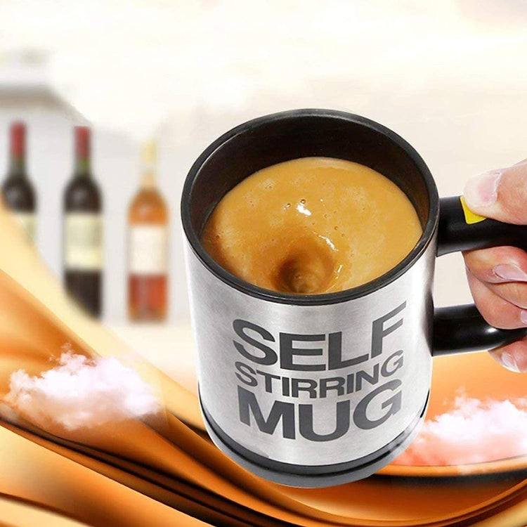 Self-stirring mug filled with hot coffee foam; “SELF STIRRING MUG” logo visible