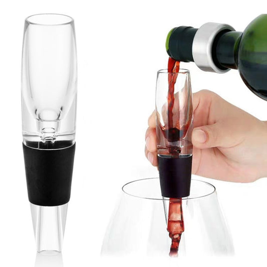 Wine pourer decanter with black base and clear spout, pouring red wine into glass