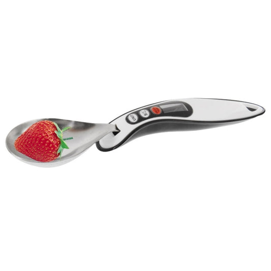 LCD multi-digital measuring spoon with silver bowl and dark handle, strawberry beside it