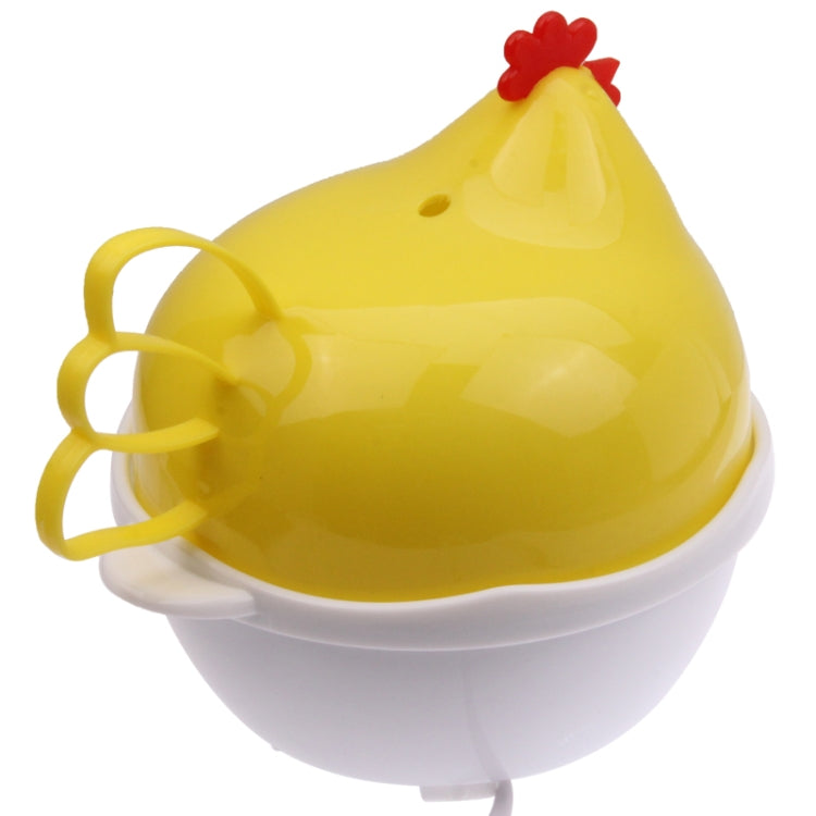 Side view of yellow hen-shaped egg boiler with red comb and white base.