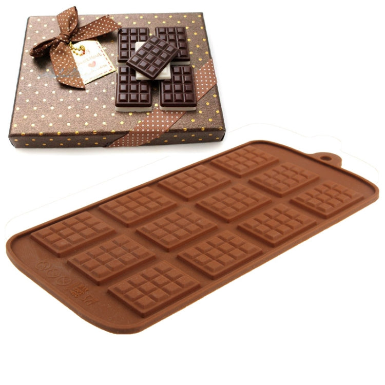 Brown silicone chocolate mold tray with 12 square bar cavities, rectangular with loop handle