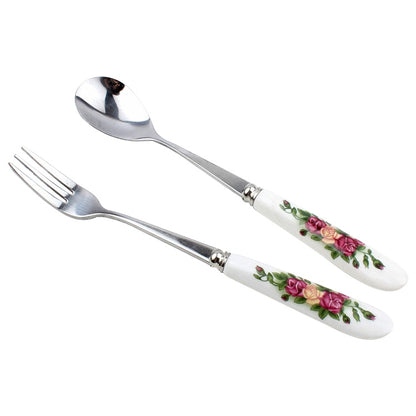 Stainless steel spoon with ceramic handle and floral rose pattern