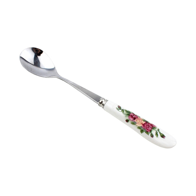 Stainless steel spoon with ceramic handle and pink rose floral detail