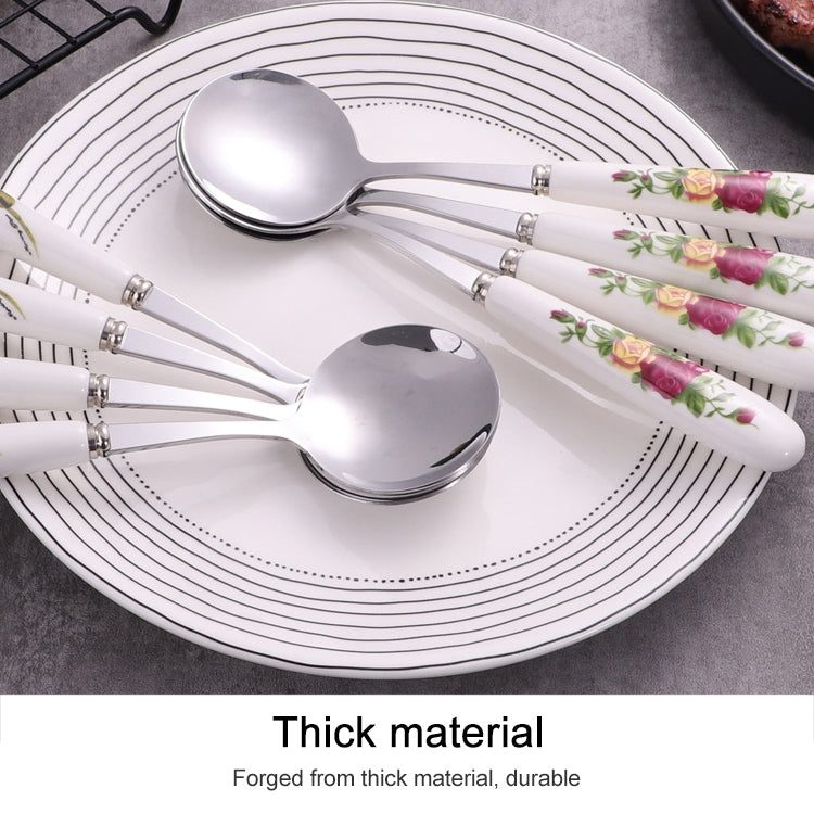 Stainless steel spoon and fork set with white ceramic floral handles