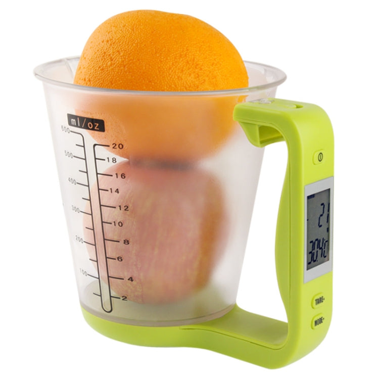 Green digital kitchen measuring cup with temperature display and handle
