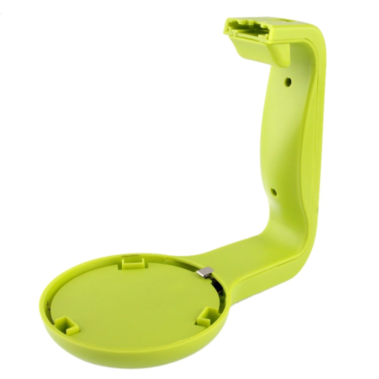 Green measuring cup handle with hinged base for storage