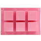 Pink silicone square cake mold with six square cutout wells