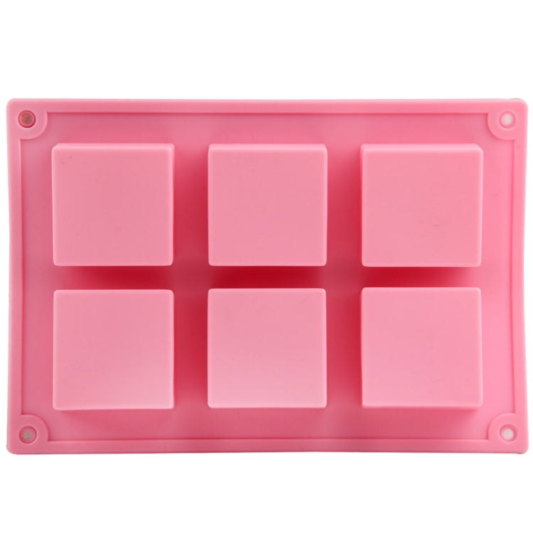 Pink silicone square cake mold with six square cutout wells