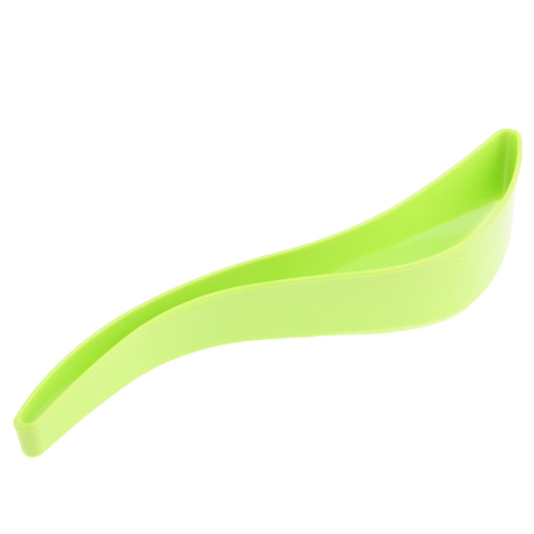 Green curved cake knife with rounded blade edge