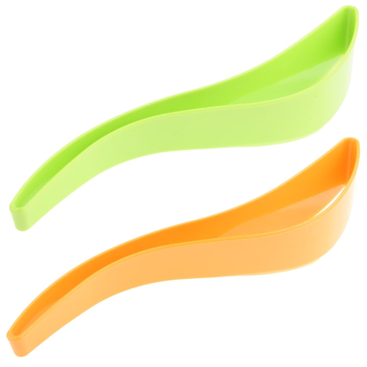 Two curved cake server tools in green and orange plastic