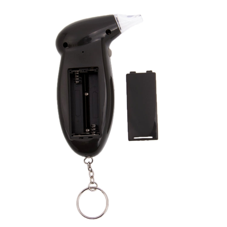 Black alcohol breath tester with open battery compartment and keychain