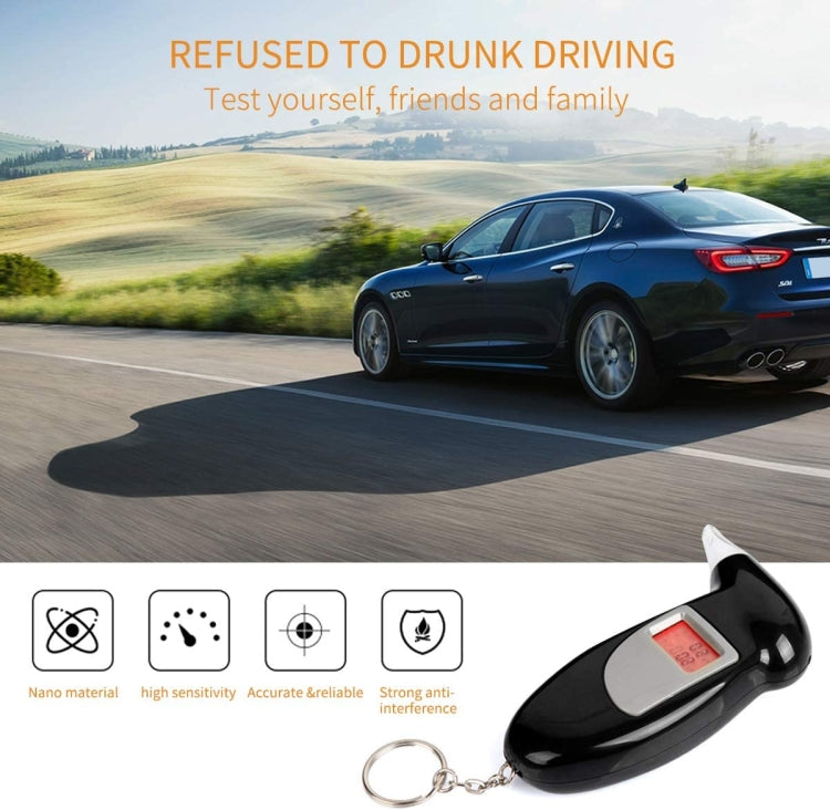 Black alcohol breath tester with keychain and red LCD measurement screen