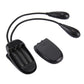 Dual-arm LED clip-on lamp with battery compartment open and power button on base