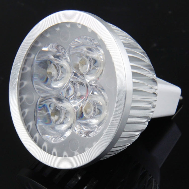 LED spotlight bulb close-up with round silver reflector and clear lens