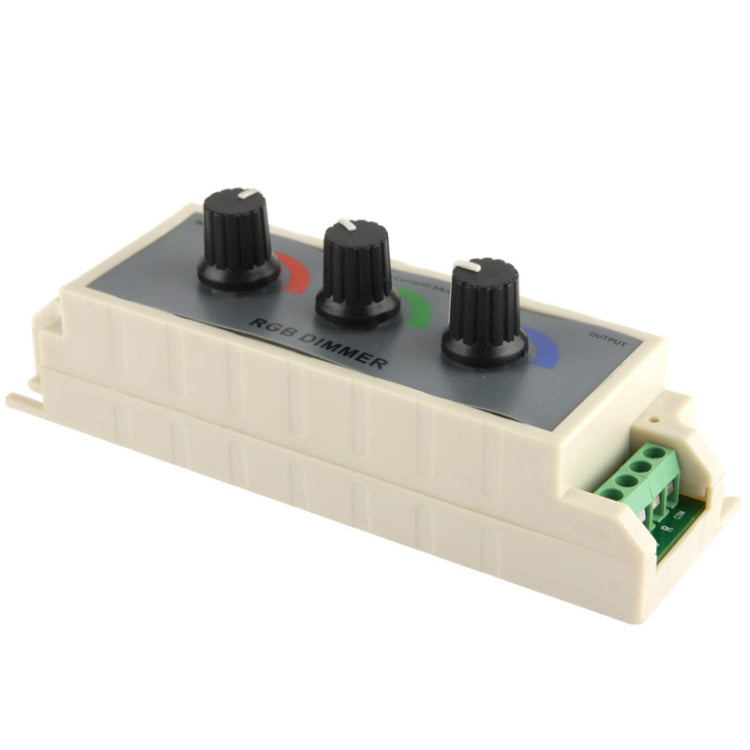 RGB dimmer controller top view with three knobs and side green terminal block