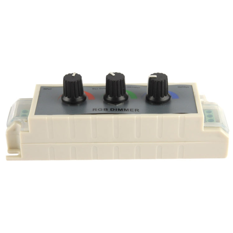 RGB dimmer controller front view with three black knobs and colored channel indicators