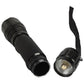 Black UV flashlight with lanyard and tail cap, angled view