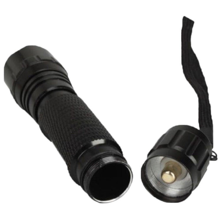 Black UV flashlight with lanyard and tail cap, angled view