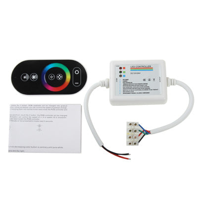Black RGB touch remote and white LED controller with wiring and instruction sheet