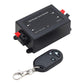 Black RF LED dimmer controller with red screw terminals and handheld key fob