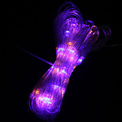 RGB LED string light with violet and blue glow, clear wire coil