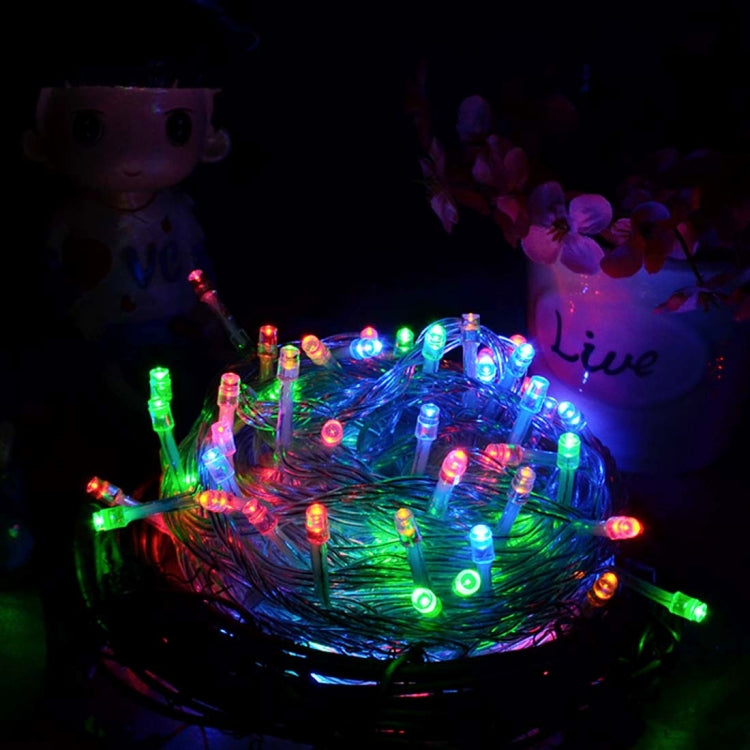 RGB LED light string looped in a coil with glowing bulbs