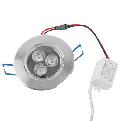 3-LED recessed light with mounting clips and a driver module connected by wires