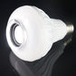 White smart LED bulb with standard screw base, angled view