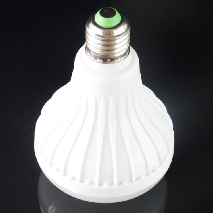 White smart LED bulb with E26 screw base and green indicator top