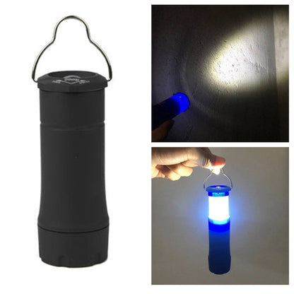 Black camping lantern flashlight with hanging handle, glowing white and blue light