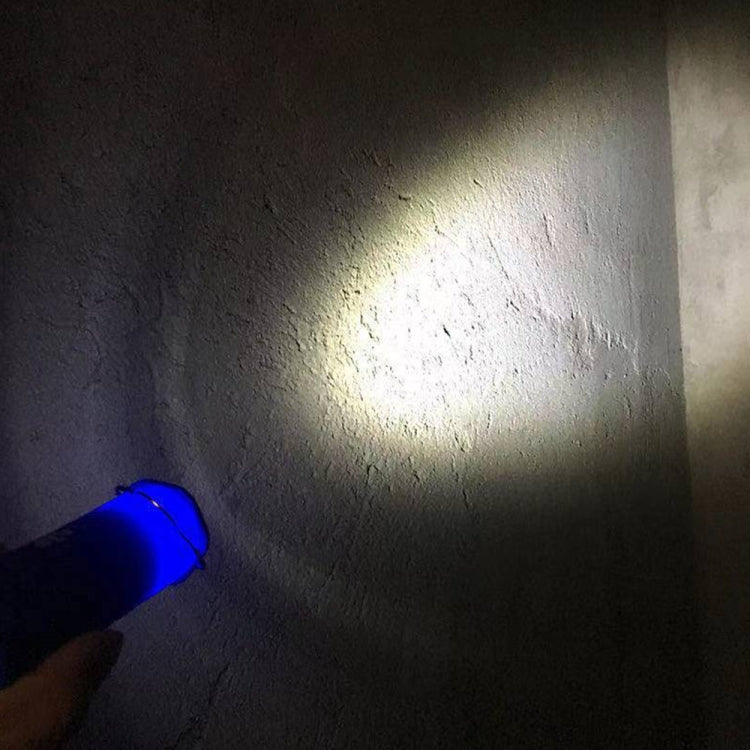 Black LED camping lantern flashlight projecting a focused beam of blue-tinted light