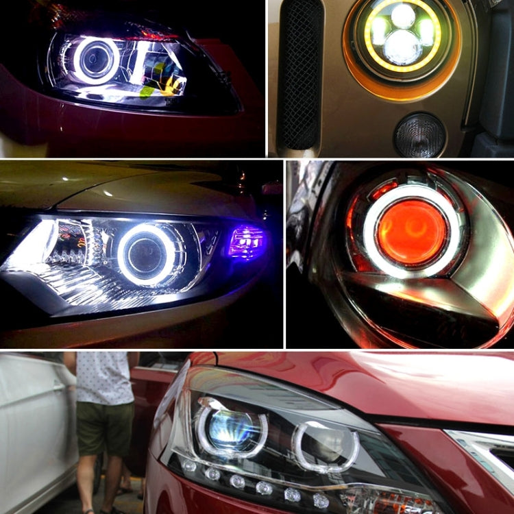 Car headlight with installed LED angel eye halos in bright white and blue accents