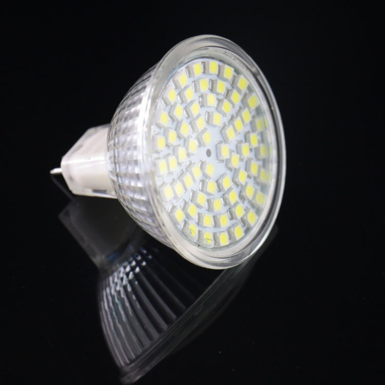White LED bulb with clear lens and bi-pin base, angled view