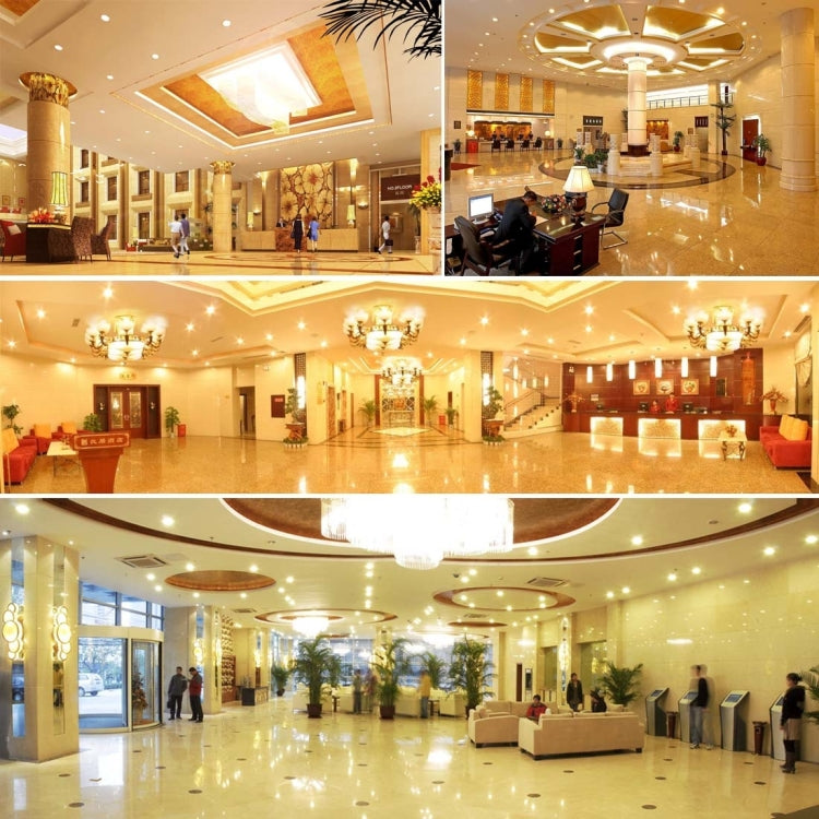 Bright white LED bulb glow in an indoor hotel lobby setting