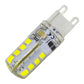 Clear two-pin SMD LED bulb, angled view of yellow LED chip strip on the capsule