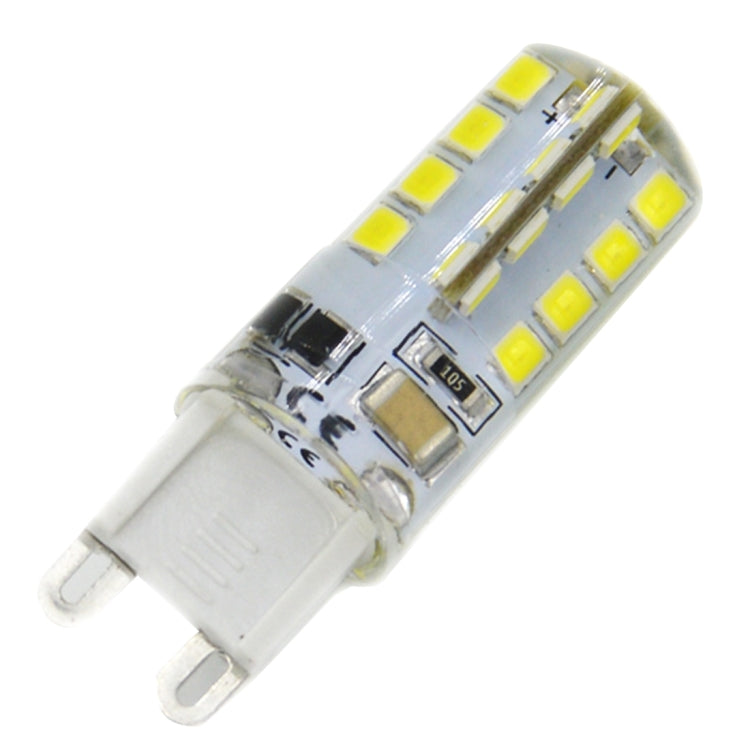 Clear two-pin SMD LED bulb with yellow square LEDs and visible connector pins
