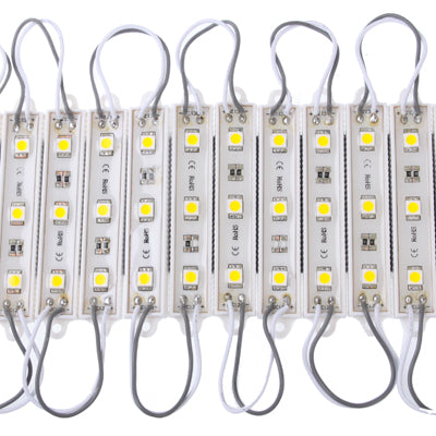 Warm white LED strip modules, straight view with gray leads and white circuit panels